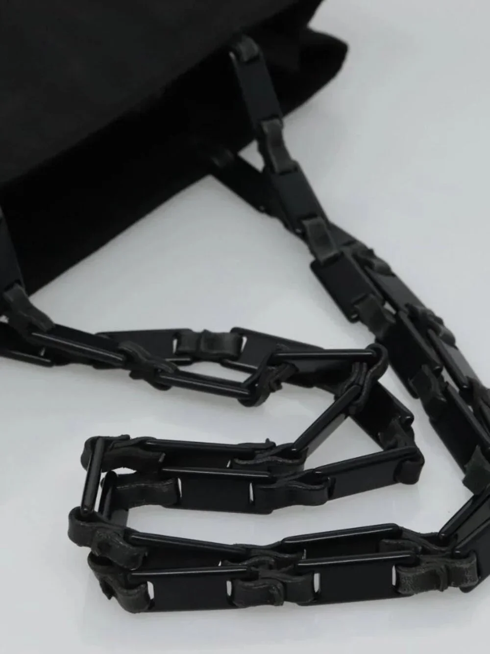 Prada brand	prada color	black